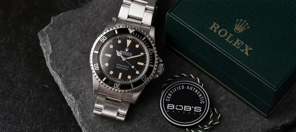AI-generated Submariner product study with a Rolex box and a conceptual Bob’s Watches authentication tag.